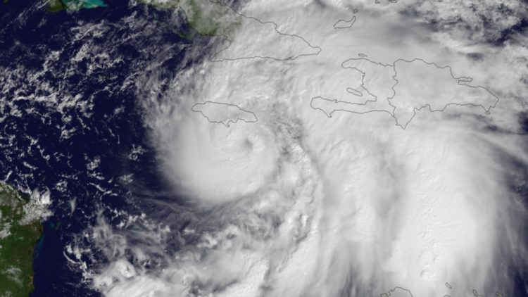 Hurricane Sandy is seen churning the western Caribbean Sea in this NASA handout satellite image taken on October 24, 2012.  Hurricane Sandy raced toward the southern coast of Jamaica on Wednesday and is expected to make landfall later in the day, the U.S. National Hurricane Center said.  REUTERS/NASA/NOAA/GOES Project/Handout (UNITED STATES - Tags: SCIENCE TECHNOLOGY ENVIRONMENT) FOR EDITORIAL USE ONLY. NOT FOR SALE FOR MARKETING OR ADVERTISING CAMPAIGNS. THIS IMAGE HAS BEEN SUPPLIED BY A THIRD PARTY. IT IS DISTRIBUTED, EXACTLY AS RECEIVED BY REUTERS, AS A SERVICE TO CLIENTS