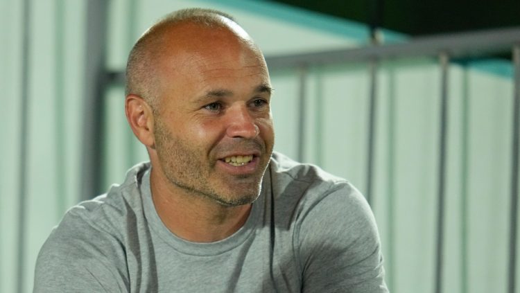 Former Spain player Andres Iniesta talks to reporters as the team works out during his Spain's official training session at Qatar University, in Doha, Qatar, Wednesday, Nov. 30, 2022. Spain will play its final match in Group E in the World Cup soccer tournament against Japan on Dec. 1. (AP Photo/Julio Cortez)