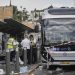 Israeli police and rescue teams inspect the scene of a shooting attack carried out by two Palestinian gunmen, in which several people were killed and others injured at a bus stop in Jerusalem, Monday, Sept. 8, 2025. (AP Photo/Mahmoud Illean)