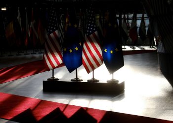 European and US flags in European Council in Brussels, Belgium on April 4, 2023.