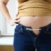 pregnant woman bursting out of jeans. Paul Viant, Digital Vision via Getty Images ** OUTS - ELSENT, FPG, TCN - OUTS * NM, PH, VA if sourced by CT, LA or MoD **