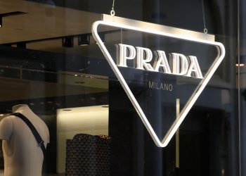 FILE PHOTO: The logo of Prada is seen in a shop in Paris, France, February 12, 2023. REUTERS/Yves Herman
