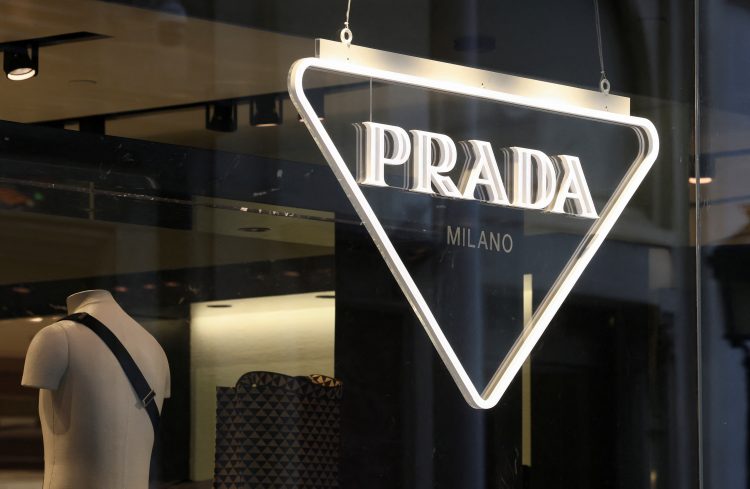 FILE PHOTO: The logo of Prada is seen in a shop in Paris, France, February 12, 2023. REUTERS/Yves Herman