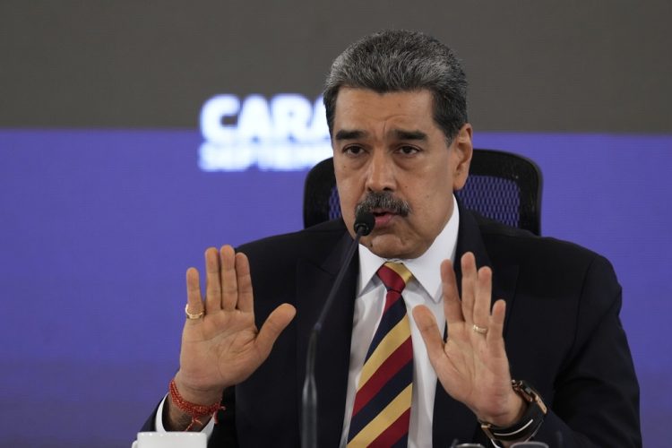 President Nicolas Maduro gives a press conference in Caracas, Venezuela, Monday, Sept. 1, 2025. (AP Photo/Ariana Cubillos)