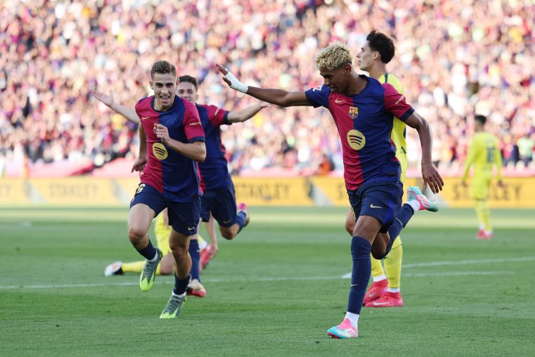 BARCELONA, SPAIN - MAY 18: Lamine Yamal of FC Barcelona celebrates scoring his team's first goal with teammate Fermin Lopez during the La Liga EA Sports match between FC Barcelona and Villarreal CF at Estadi Olimpic Lluis Companys on May 18, 2025 in Barcelona, Spain.  (Photo by Judit Cartiel/Getty Images)