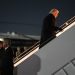 President Donald Trump boards Air Force One for a trip to attend the World Economic Form in Davos, Tuesday, Jan. 20, 2026, at Joint Base Andrews, Md. (AP Photo/Evan Vucci)