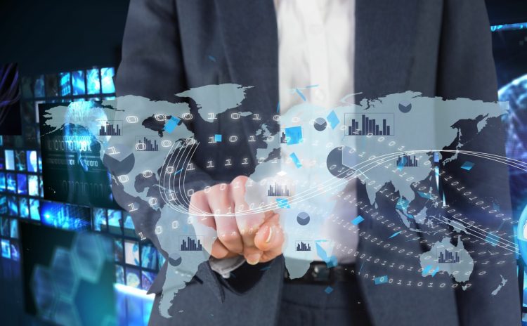 composite of businessman pointing at graphics