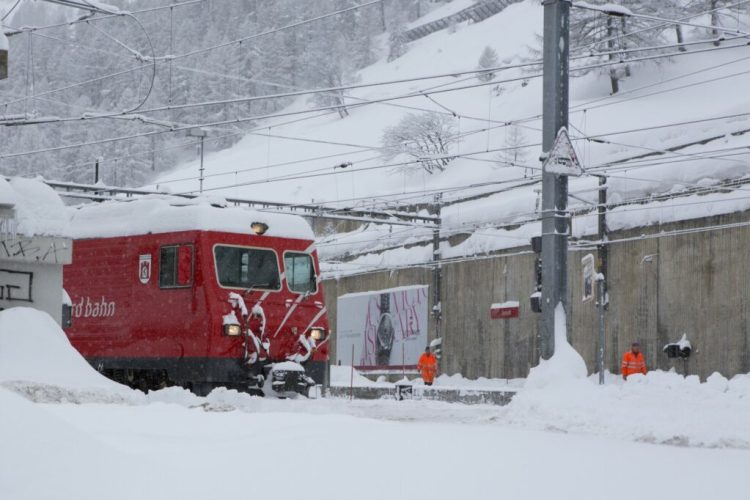 epa06460608 A train engine idles at Zermatt station due to the closure of the train track to Taesch, Visp and Fiesch, in Zermatt, Switzerland, 21 January 2018. Due to heavy snowfall, Zermatt can only be reached by air. Swiss authorities have closed roads and train service into the town of Zermatt amid a heightened risk of avalanches.  EPA/PHILIPPE MOOSER