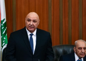 Newly elected Lebanese president Joseph Aoun (L) stands next to the parliament speaker Nabih Berri as he delivers a speech at the parliament building in Beirut January 9, 2025. Lebanon's lawmakers elected army chief Joseph Aoun as president on January 9, after a two-year vacancy of the position, in a step towards lifting the war-battered country out of financial crisis. (Photo by Anwar AMRO / AFP)