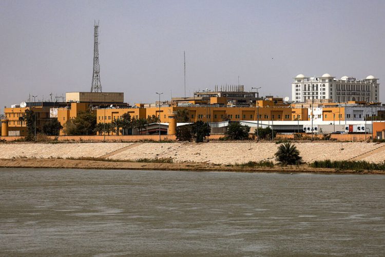 TOPSHOT - The US embassy headquarters in Iraq is pictured in Baghdad's fortified "Green Zone" on March 8, 2026. Air defence systems intercepted rockets fired at the US embassy in Baghdad late on March 7, security sources told AFP. It is the first such attack on the embassy in Baghdad since the start of the war in the Middle East, triggered by a joint US-Israeli attack on Iran, into which Iraq has been dragged. (Photo by AHMAD AL-RUBAYE / AFP via Getty Images)