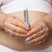 Woman showing opened Semaglutide Injection pen or insulin cartridge pen. Weight loss and diabetes concept.