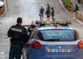 Rome, Italy - October 9, 2020: policeman on patrol with Italian police car, in checkpoint in the city.